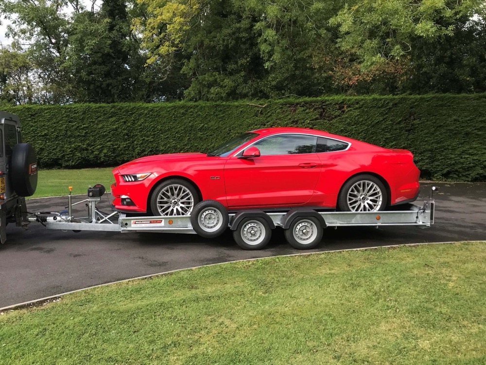 Tilt bed and car transporter trailer